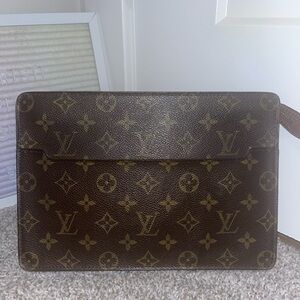 Louis Vuitton Monogram Pochette Homme clutch bag in monogram canvas